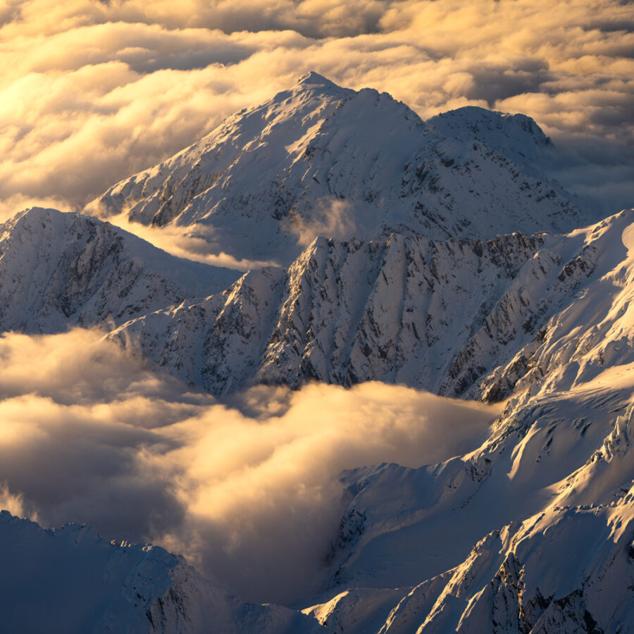Snow covered mountains and cloud, New Zealand